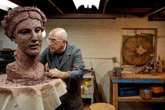 Modeling Thalia in clay — the artist’s studio.